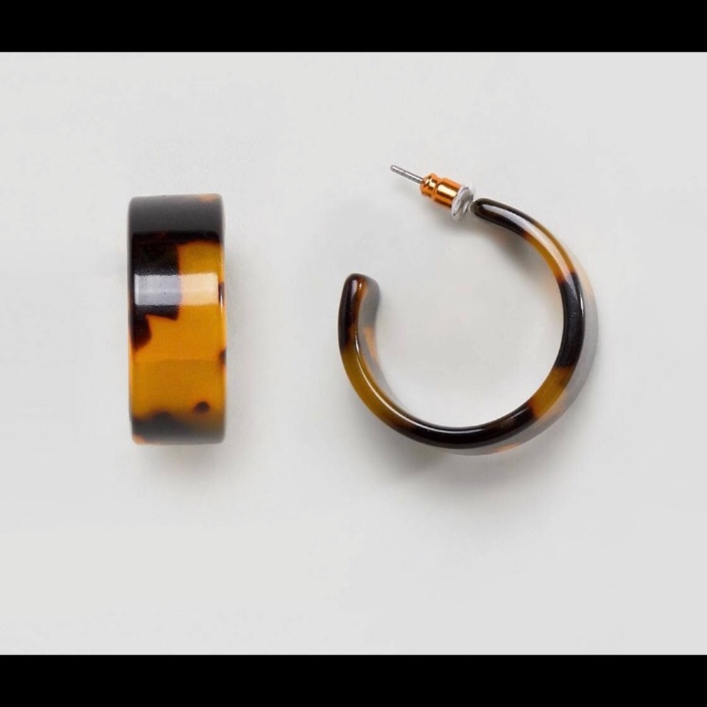 Tortoiseshell hoop earrings. Never been worn.